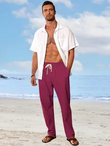 Full length view of men's loose and breathable maroon cotton linen beach pants on model