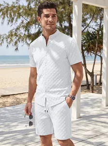 Men's summer white jacquard shirt and shorts set shown in a beach resort setting