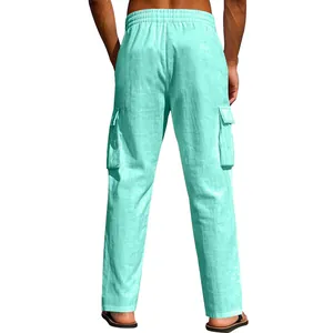 Back view of men's mint green linen cargo pants showing pockets and loose fit design
