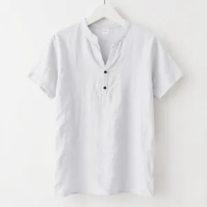 Close-up detail of light grey linen blend short sleeve shirt with stand collar