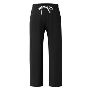 Detail of black loose breathable straight-leg casual trousers with drawstring waist