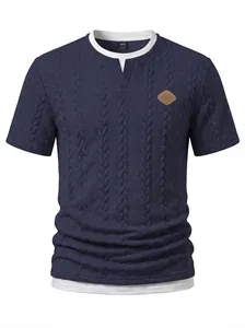 Macro view of men's navy cable knit T-shirt with textured fabric and leather patch
