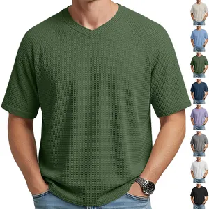 Detail view of men's V-neck waffle knit short sleeve T-shirt in multiple colors
