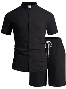 Close-up detail of black textured jacquard fabric for men's short-sleeve shirt and shorts