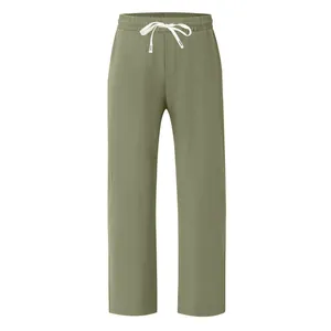 Detailed look at men's lightweight olive green wide-leg casual pants with drawstring