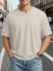 Men's V-neck waffle knit t-shirt with raglan sleeves in a casual street style look