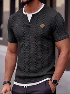 Detail view of men's slim fit textured jacquard T-shirt with fake two-piece design