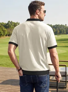 Vue arrière d'un polo pour homme en maille gaufrée crème avec une bordure noire