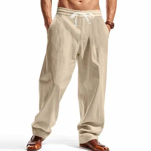 Macro view of loose beige pants showcasing the lightweight breathable fabric texture