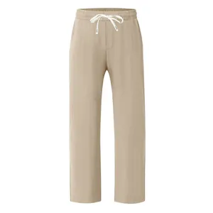 Close-up of khaki breathable loose wide-leg men's casual pants with drawstring