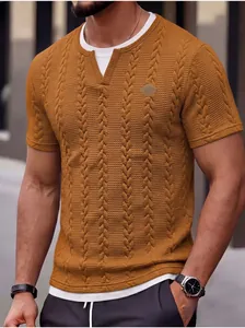 Detail view of mustard yellow cable knit textured t-shirt with fake two-piece collar