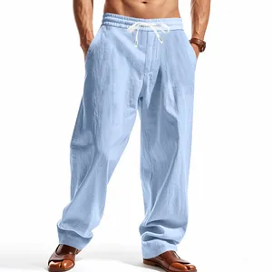 Light blue men's loose wide-leg trousers with elastic drawstring waist for summer.