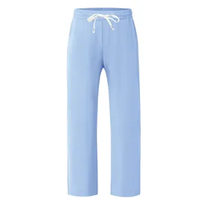 Detail view of light blue men's breathable loose wide-leg pants with drawstring waist