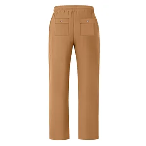 Back view detail of men's loose breathable straight casual pants in tan color