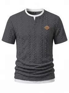 Close-up of men's slim fit textured jacquard t-shirt with faux two-piece design