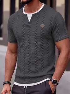 Close-up of men's grey textured jacquard T-shirt with faux two-piece collar and logo