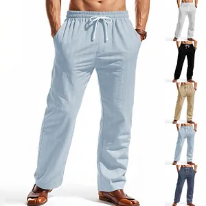 Detail view of breathable vertical striped linen beach pants for men with drawstring.