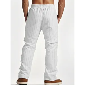 Back view detail of men's white vertical striped linen straight-leg beach trousers