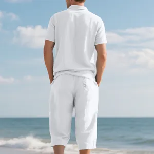 Back view of men's white linen short sleeve Polo shirt and relaxed 7-point beach pants