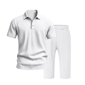 Detail view showing the texture of white linen polo and cropped pants set