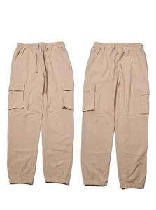 Front and back view of men's beige linen cargo pants with drawstring waist