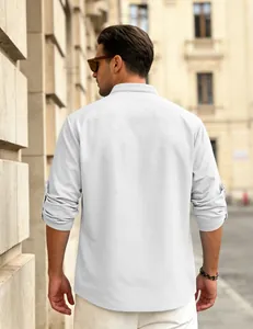 Detail of men's white waffle knit long sleeve shirt in casual urban street setting