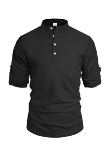Macro detail of black waffle knit Henley shirt showing rolled-up sleeves and buttons