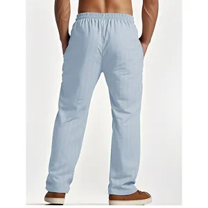 Back view detail of men's light blue vertical striped breathable linen beach trousers