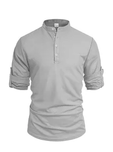 Detail showing the grey waffle knit texture and roll-up sleeves of this men's Henley shirt