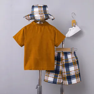 Boys summer three-piece set: yellow short-sleeve shirt, plaid shorts, and bucket hat.