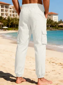 Back view of lightweight men's white linen cargo joggers with pockets for beach vacations