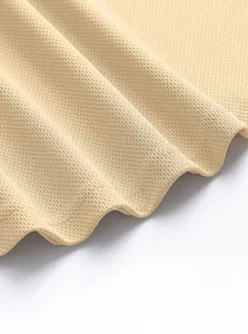Close-up of high-quality breathable mesh fabric on a men's quick-dry sports vest detail