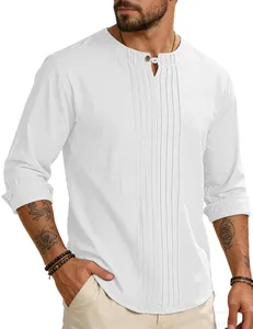 Detail view of a white cotton linen long-sleeve shirt featuring pleated chest design