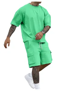 Professional full view of men's loose mint green summer T-shirt and cargo shorts outfit set