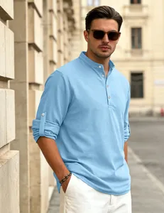 Close-up of light blue waffle knit Henley shirt with roll-up sleeve detail