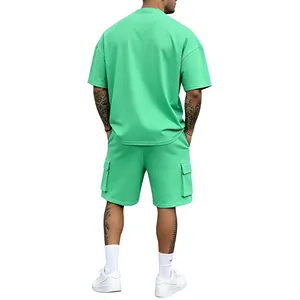 Back view of men's summer light green casual sports T-shirt and shorts two-piece set