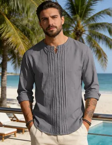 Detail view of grey cotton linen men shirt with front pleats and round neck