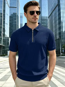 Detail view of navy blue vertical ribbed knit polo shirt featuring a half-zip collar design