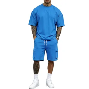 Full view of blue oversized men's sporty T-shirt and cargo shorts set on model