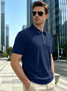 Detailed view of the vertical stripe texture and metal zip on a navy knit polo shirt