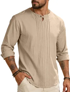 Front view detail of a men's loose beige cotton linen shirt with pleated design