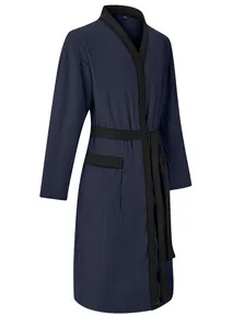 Detail of men's navy blue jacquard bathrobe with black trim and adjustable waist belt