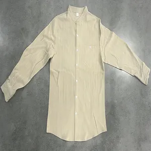 Flat lay view of men's beige linen stand collar shirt with subtle vertical stripes