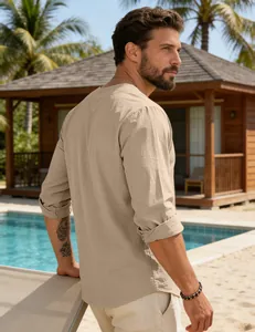 Back view of men's casual khaki cotton linen shirt with rolled sleeves at a resort pool