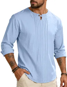 Detail of men's light blue cotton linen shirt with pleated front and round neck