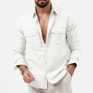 Detail view of a men's white workwear shirt featuring dual chest pockets and lapel collar.