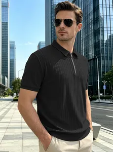 Close-up of black vertical striped jacquard knit polo shirt with stylish half-zip detail.