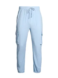 Front view of light blue linen cargo pants featuring drawstring waist and elastic cuffs