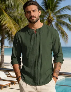 Men's olive green cotton linen long sleeve shirt in tropical resort setting