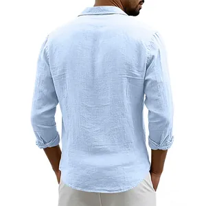 Back view of men's light blue long sleeve linen shirt featuring a relaxed loose fit detail